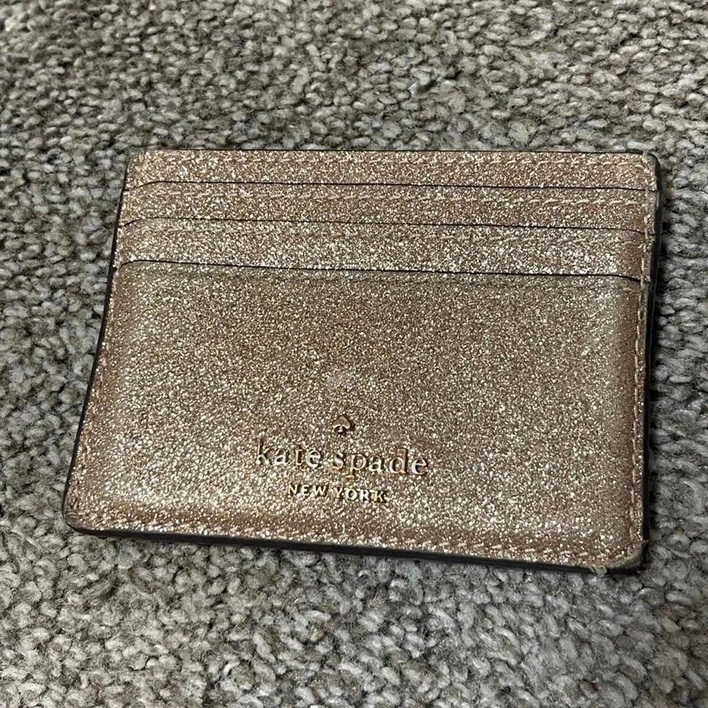 Kate Spade New York gold glitter card holder